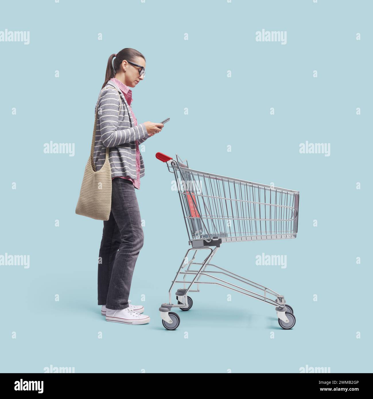 Woman trolley behind hi-res stock photography and images - Alamy