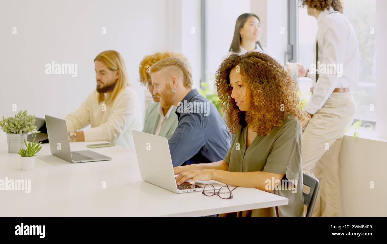 Diverse people working in a coworking space Stock Photo