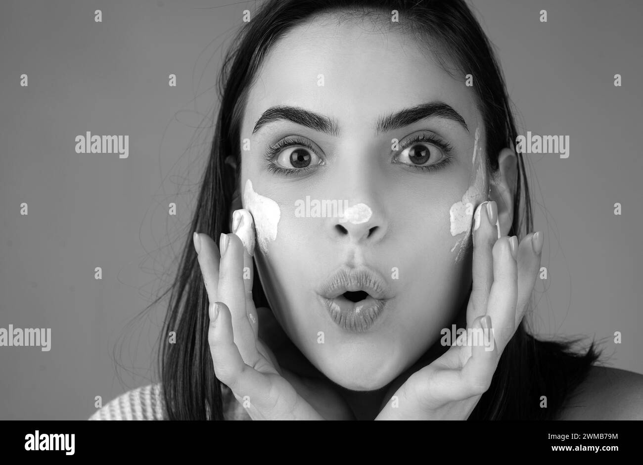 Beauty portrait of beautiful female model. Amazed surprised woman with ...