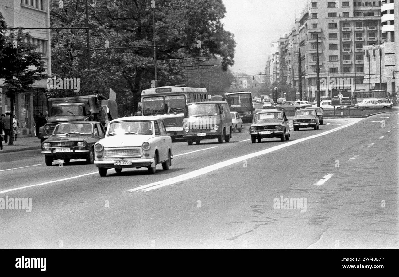 Bucharest, Romania, approx. 1980.  Vehicles driving on Boulevard I.C. Bratianu through the University Square in downtown Bucharest. Stock Photo