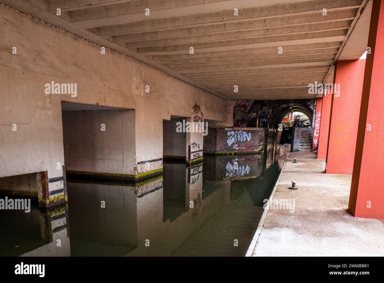 Graffiti and spray can paint artwork along the Fazeley canal in the