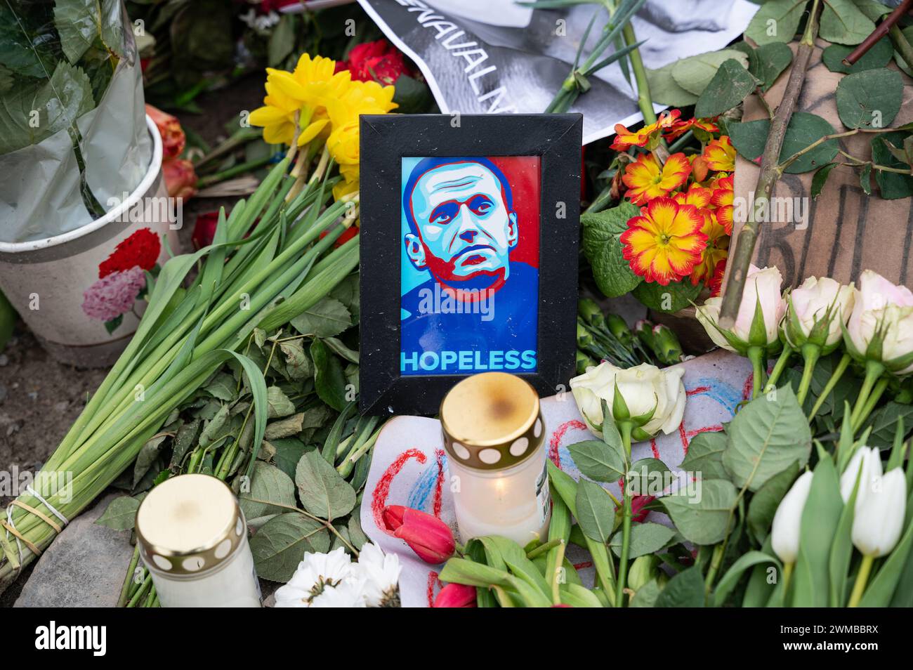 24.02.2024, Berlin, Germany, Europe - A makeshift memorial made of flowers, candles and pictures for Russian opposition leader Alexei Navalny. Stock Photo