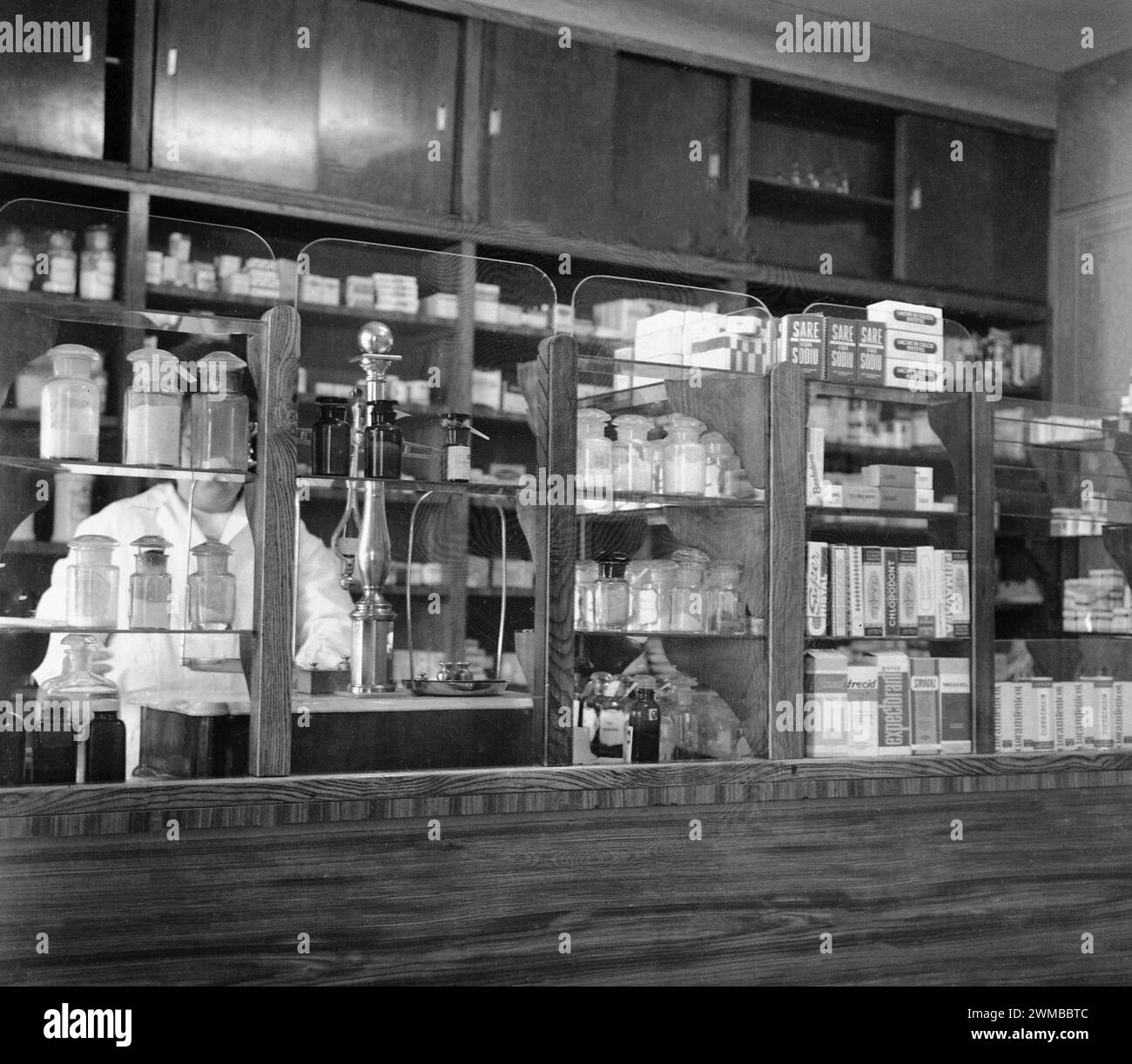 Interior of a drug store in the Socialist Republic of Romania, approx. 1977 Stock Photo