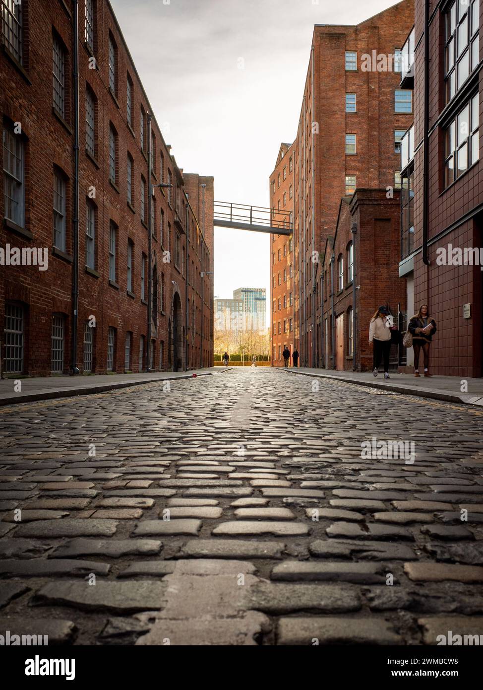 Cobbles on street in East Manchester (Ancoats), old warehouse / mill
