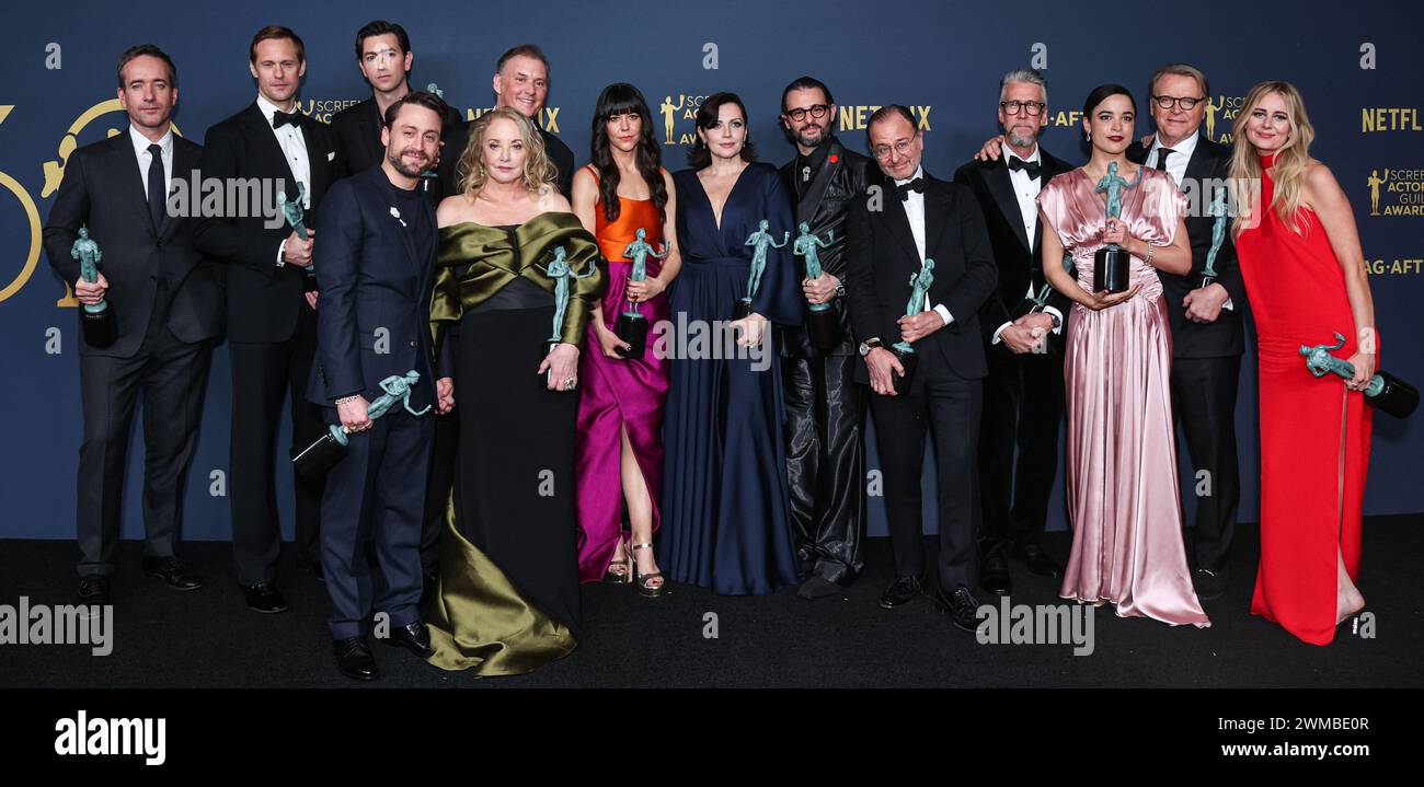 LOS ANGELES, CALIFORNIA, USA - FEBRUARY 24: Matthew Macfadyen, Kieran Culkin, J. Smith-Cameron, Scott Nicholson, Alexander Skarsgård, Dagmara Dominczyk, Zoe Winters, Fisher Stevens, Nicholas Braun, Arian Moayed, Alan Ruck, Juliana Canfield, David Rasche and Justine Lupe, winners of the Outstanding Performance by an Ensemble in a Drama Series award for 'Succession' pose in the press room at the 30th Annual Screen Actors Guild Awards held at the Shrine Auditorium and Expo Hall on February 24, 2024 in Los Angeles, California, United States. (Photo by Xavier Collin/Image Press Agency) Stock Photo