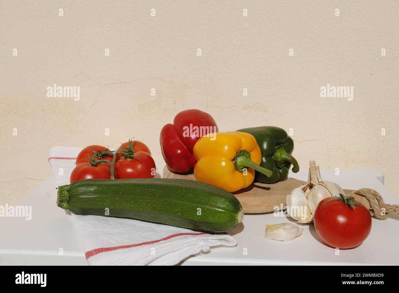 fresh vegetables tomato, bell pepper, courgette, garlic. Healthy food also favorite by vegetarian and vegan Stock Photo