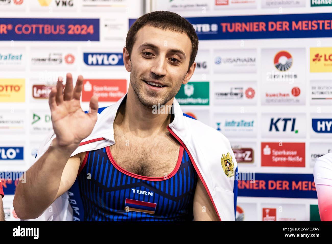 Cottbus, Germany. 25th Feb, 2024. Gymnastics: Olympic qualification/World Cup, men: vault, final; in the Lausitz Arena. Artur Davtyan from Armenia reacts after his routine. Credit: Frank Hammerschmidt/dpa/Alamy Live News Stock Photo