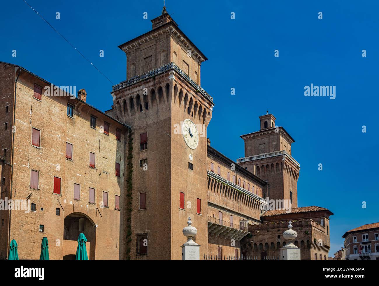 Ferrara, Emilia Romagna, Italy. The imposing Estense castle, built by the noble Este family, with its towers and moat full of water. UNESCO World Heri Stock Photo