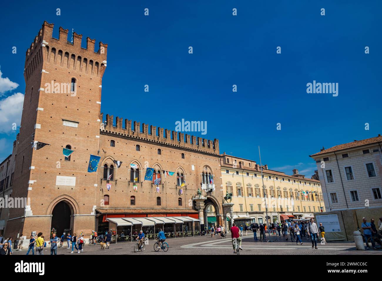 June 4, 2023 - Ferrara, Emilia Romagna, Italy. The Victory Tower and the Municipal Palace, with the bronze statues of the Este family, in the Cathedra Stock Photo