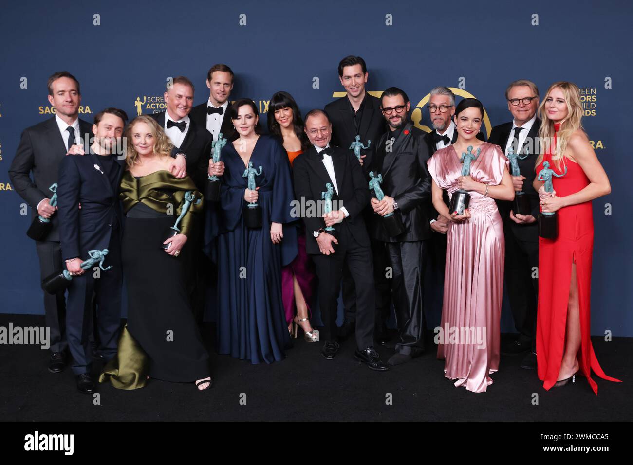 LOS ANGELES, CALIFORNIA - FEBRUARY 24: (L-R) Matthew Macfadyen, Kieran Culkin, J. Smith-Cameron, Scott Nicholson, Alexander Skarsgård, Dagmara Dominczyk, Zoe Winters, Fisher Stevens, Nicholas Braun, Arian Moayed, Alan Ruck, Juliana Canfield, David Rasche and Justine Lupe, winners of the Outstanding Performance by an Ensemble in a Drama Series award for 'Succession' pose in the press room during the 30th Annual Screen Actors Guild Awards at Shrine Auditorium and Expo Hall on February 24, 2024 in Los Angeles, California. Photo: CraSH/imageSPACE Stock Photo
