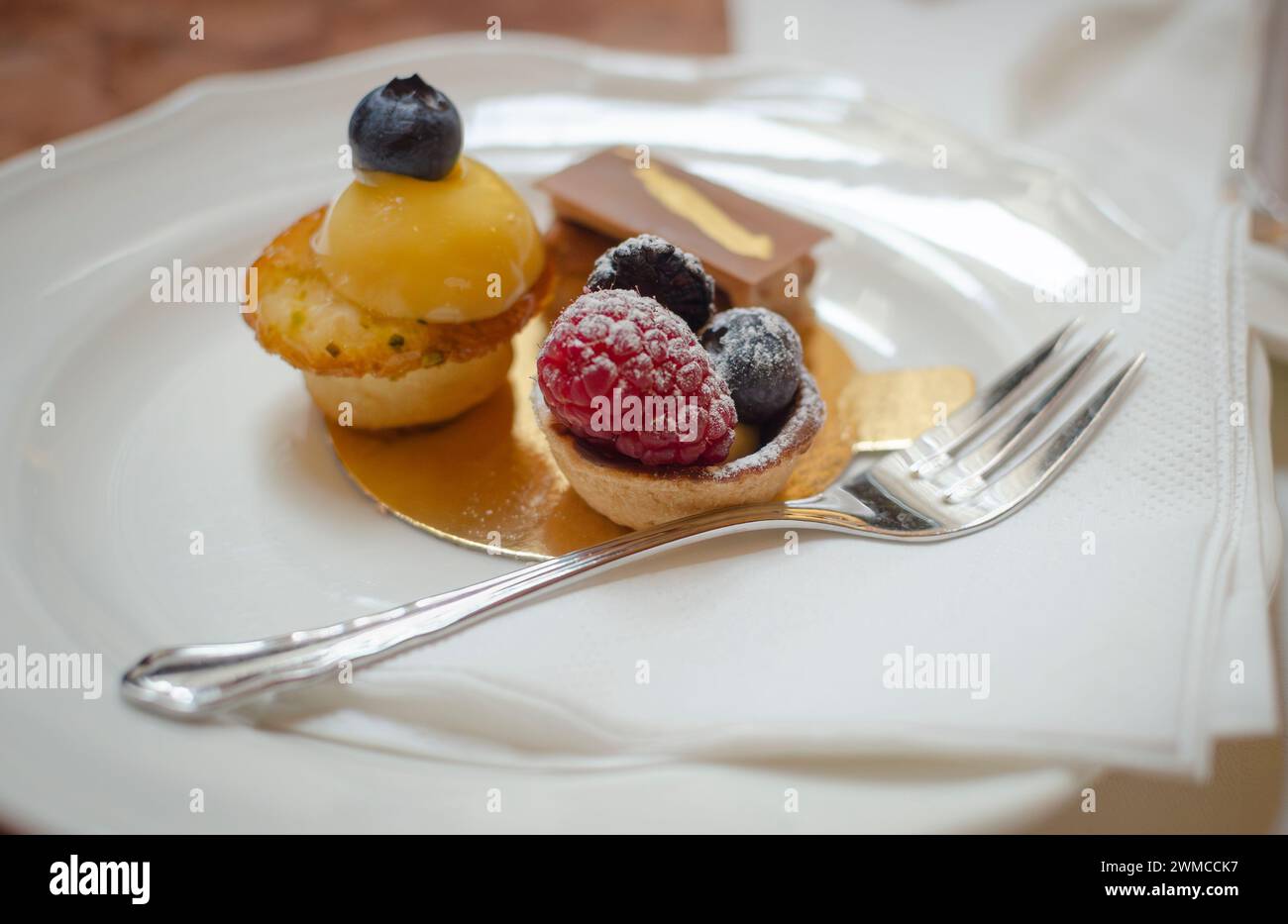 appetizing dessert fruit cakes separation by depth of field Stock Photo