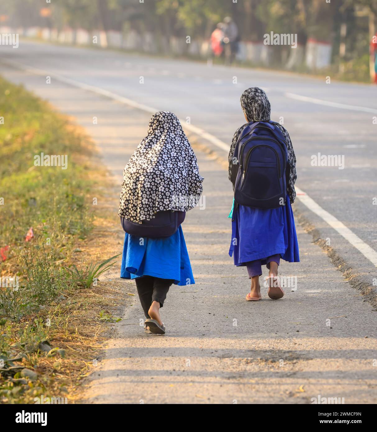Bangladeshi village girls going to school.this photo was taken from Khulna,bangladesh. Stock Photo