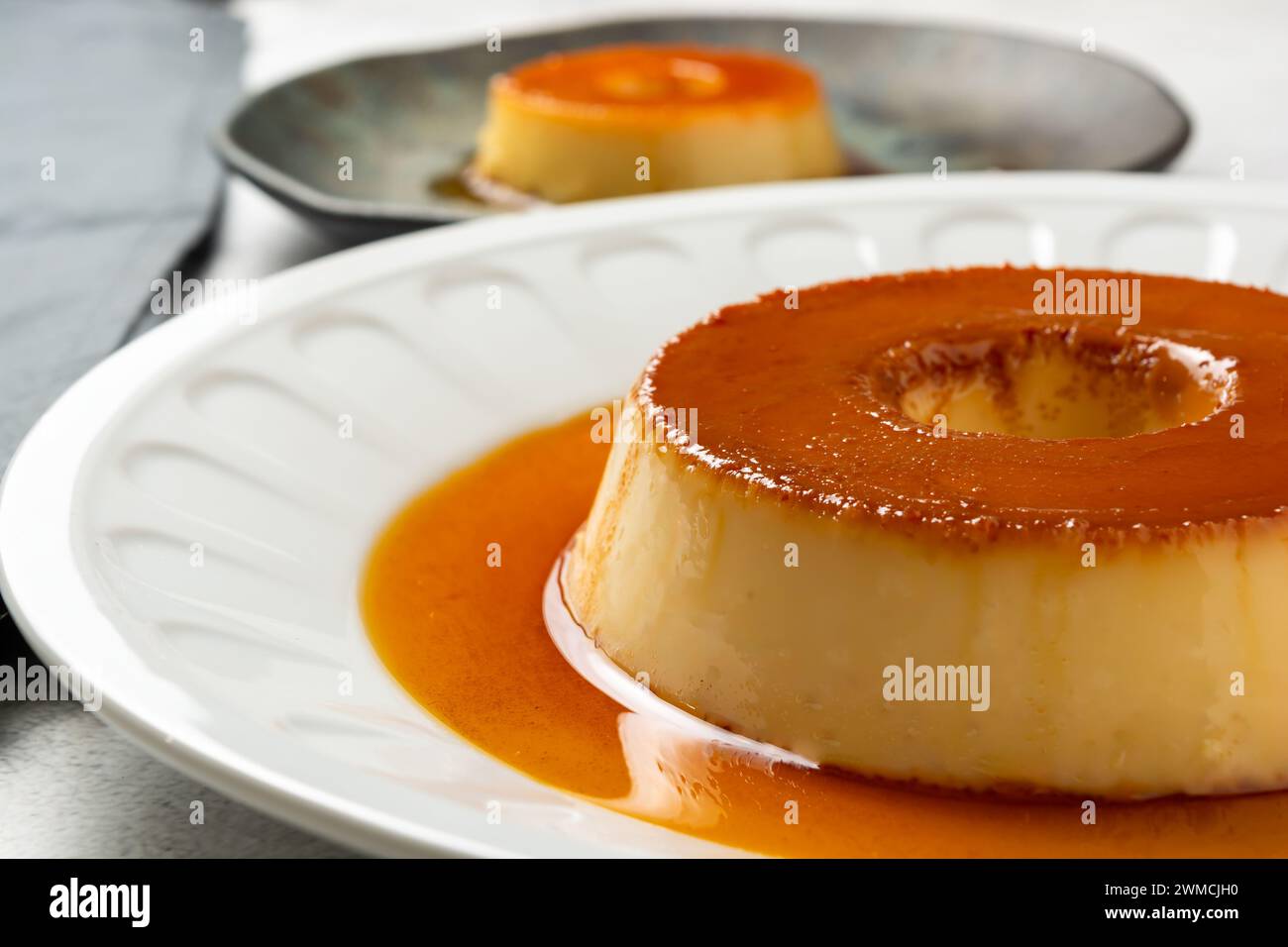 A traditional Brazilian pudding known as pudim de leite or flan Stock Photo