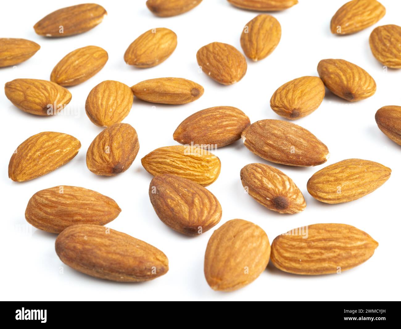 Fresh healthy almond nuts on white background. Stock Photo