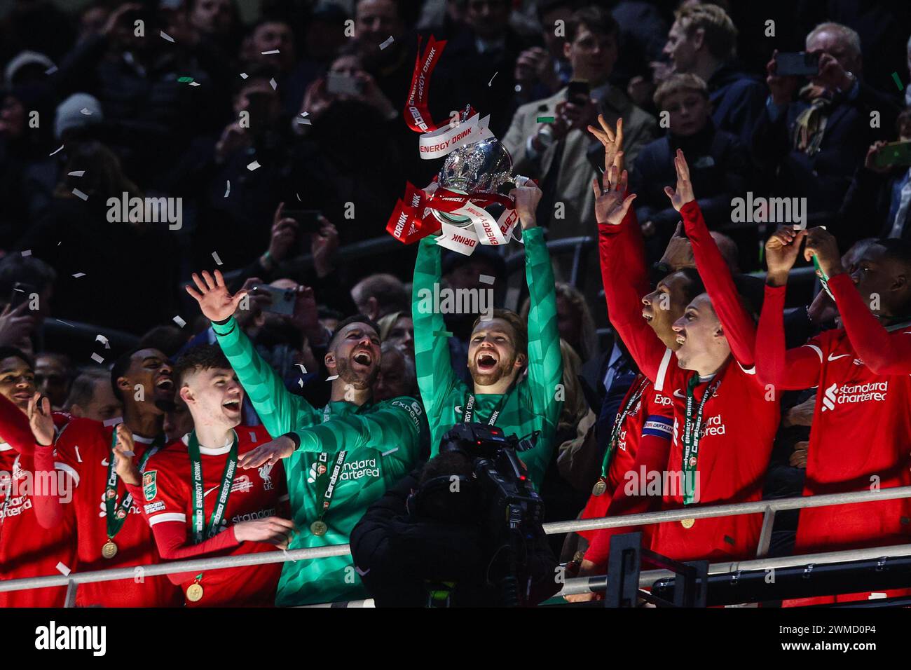 LONDON, UK - 25th Feb 2024:  Caoimhin Kelleher of Liverpool celebrates with the trophy after the EFL Carabao Cup Final match between Chelsea FC and Liverpool FC at Wembley Stadium  (Credit: Craig Mercer/ Alamy Live News) Stock Photo