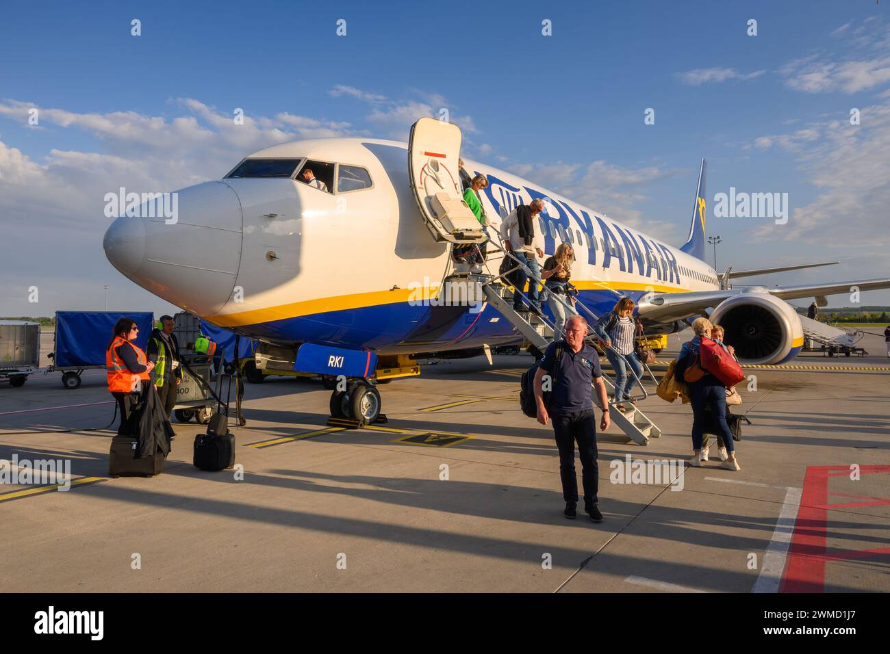 Kos, Greece - May 13, 2023: Travelers disembark from the passenger plane of Ryanair airlines. Kos International Airport. Greece Stock Photo