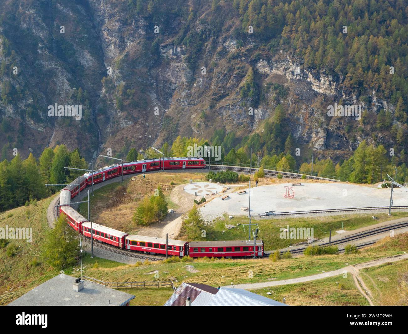 Alp Grüm, Switzerland - October 14th 2023: A red train of Rhaetian ...