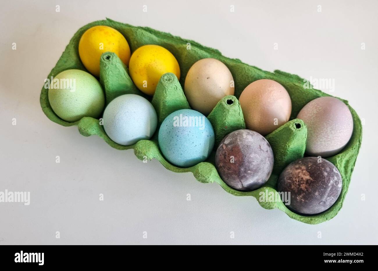 Naturally dyed Easter eggs in red wine Stock Photo
