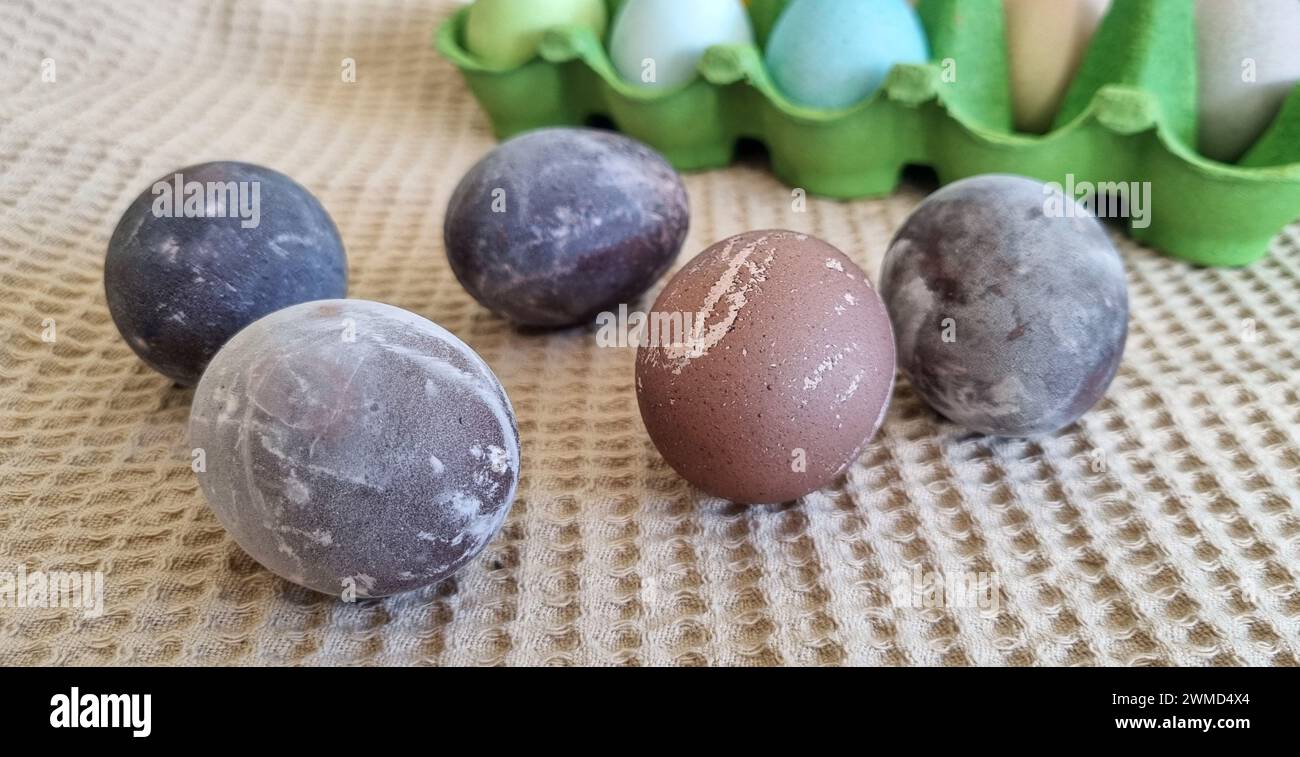 Naturally dyed Easter eggs in red wine Stock Photo