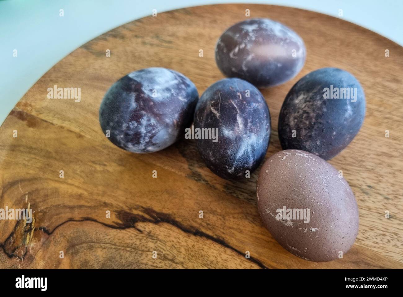 Naturally dyed Easter eggs in red wine Stock Photo