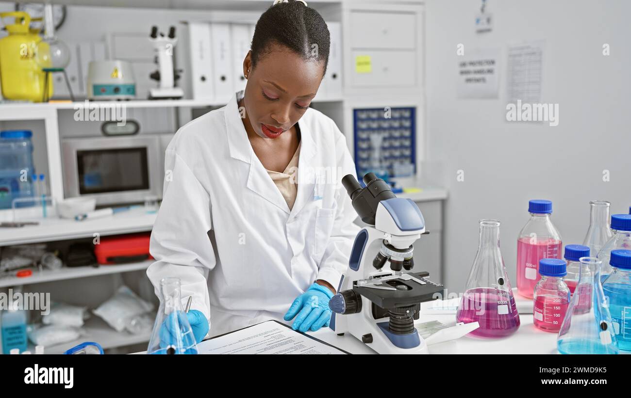 In the heart of the lab, attractive african american woman scientist ...