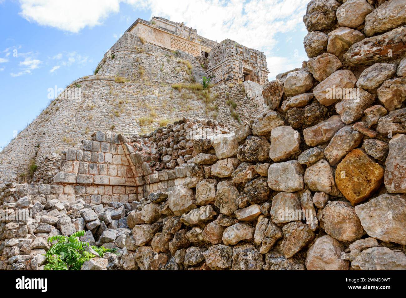 Merida Mexico,Puuc style Uxmal Archaeological Zone Site,Zona Arqueologica de Uxmal,classic Mayan city,Pyramid of the Magician Mesoamerican step pyrami Stock Photo