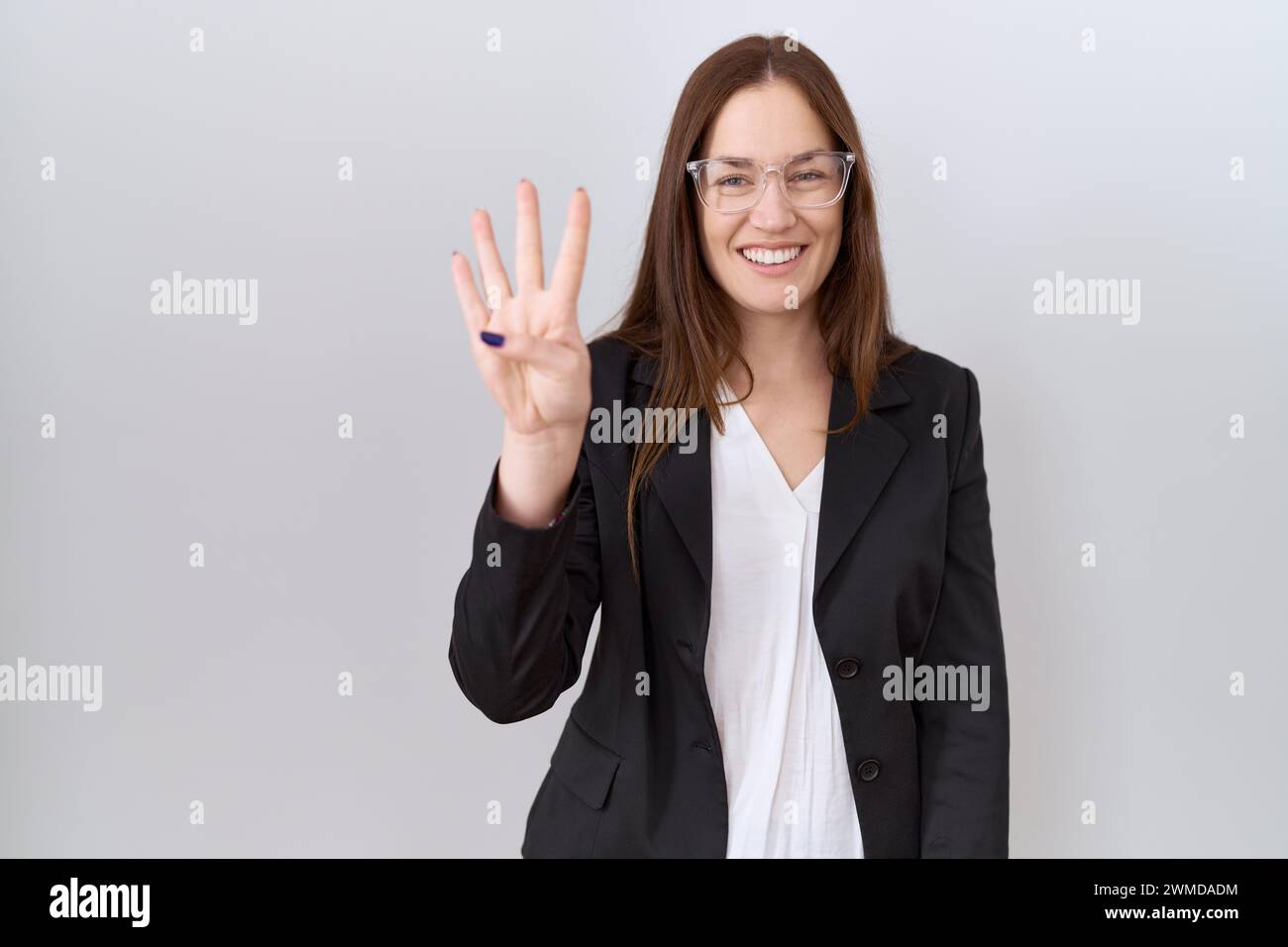 Girl showing four fingers hand hi-res stock photography and images - Alamy