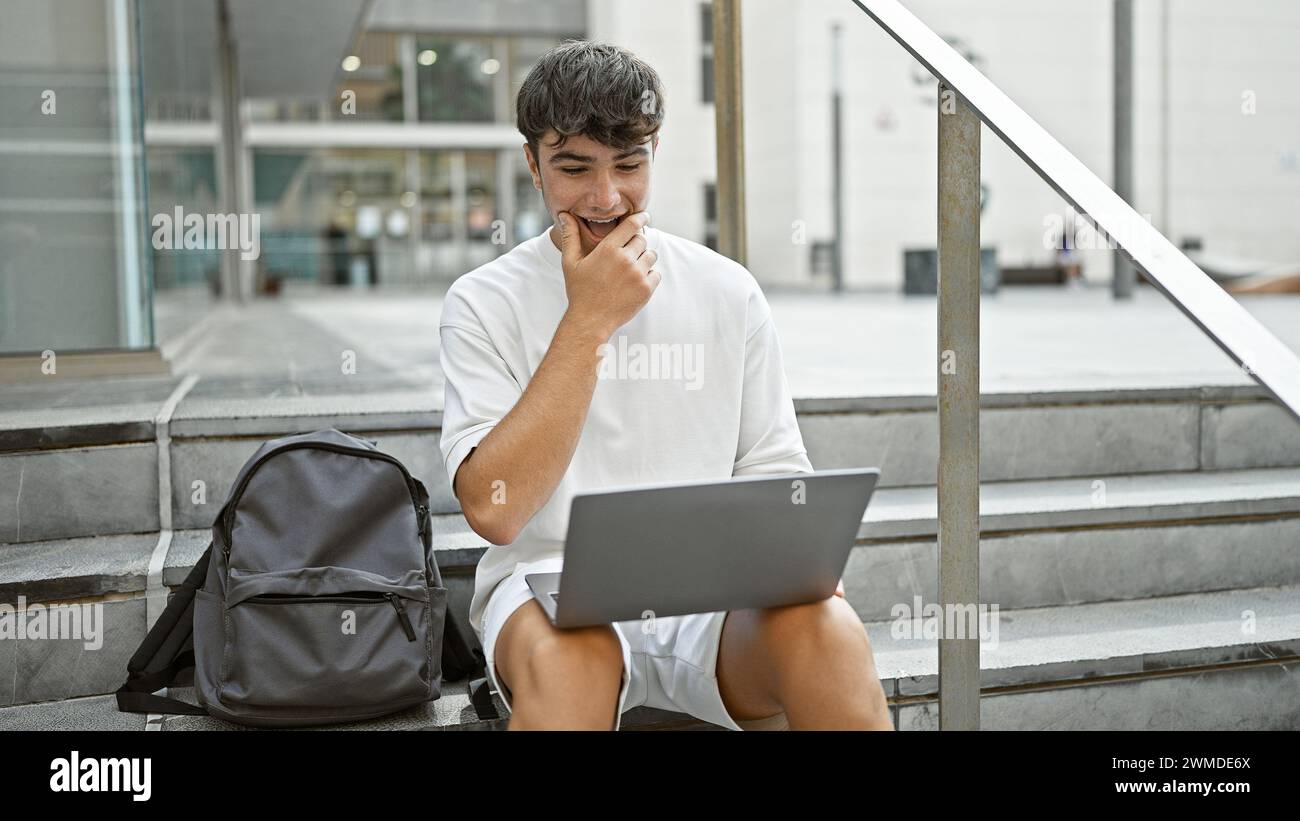 Cool, confident young hispanic male student, lifestyle portrait of a ...