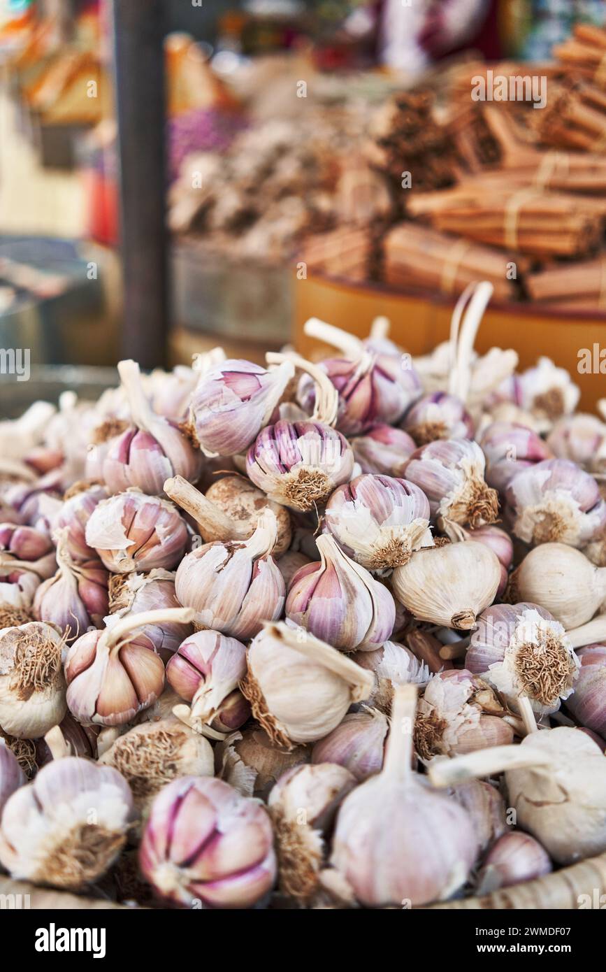 Delicious group of garlic on wicker bowl at street market Stock Photo ...