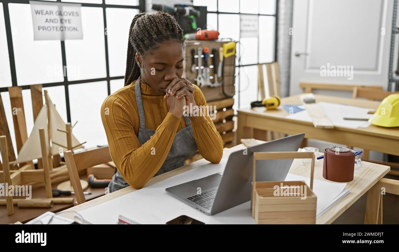 Thoughtful black woman in safety hi-res stock photography and images ...