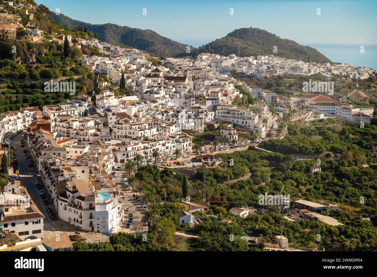 Cobblestone streets and white houses of Frigiliana dance in Andalusian charm. Stock Photo