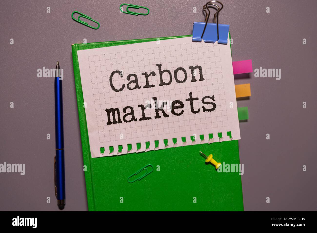 CARBON MARKETS. text on white sticker on wood background. Stock Photo