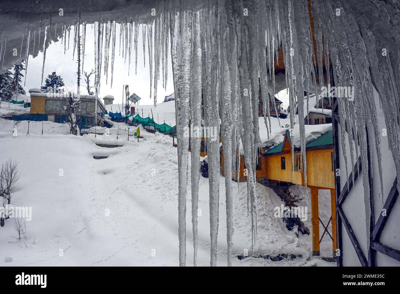 Srinagar, India. 25th Feb, 2024. SRINAGAR, INDIA - FEBRUARY 25: Icicles hang from the window of a hotet at at famous snow covered ski resort, Gulmarg, about 55kms from on February 25, 2024 in Srinagar, India. (Photo by Waseem Andrabi/Hindustan Times/Sipa USA ) Credit: Sipa USA/Alamy Live News Stock Photo