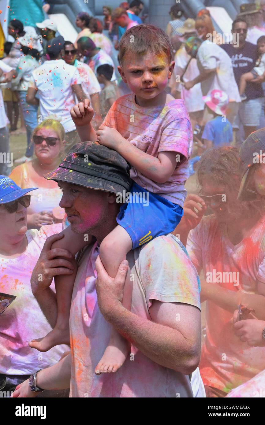 Melbourne, Victoria, Australia. 25th Feb, 2024. People celebrating Festivals of colors Holi (a part of the celebration of the oneness of the human spirit) organized by Explore Hare Krishna Valley in Melbourne. Holi is a sacred ancient tradition of Hindus, a holiday in many states of India and Nepal with regional holidays in other countries. It is a cultural celebration that gives Hindus and non-Hindus alike an opportunity to have fun banter with other people by throwing colored water and powder called Gulal at each other, honors the triumph of good over evil. Credit: ZUMA Press, Inc./Alamy Liv Stock Photo