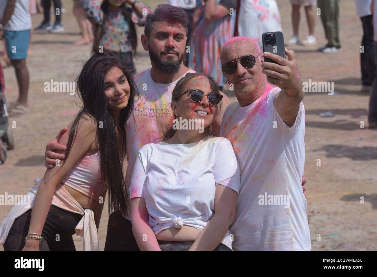 Melbourne, Victoria, Australia. 25th Feb, 2024. People celebrating Festivals of colors Holi (a part of the celebration of the oneness of the human spirit) organized by Explore Hare Krishna Valley in Melbourne. Holi is a sacred ancient tradition of Hindus, a holiday in many states of India and Nepal with regional holidays in other countries. It is a cultural celebration that gives Hindus and non-Hindus alike an opportunity to have fun banter with other people by throwing colored water and powder called Gulal at each other, honors the triumph of good over evil. Credit: ZUMA Press, Inc./Alamy Liv Stock Photo