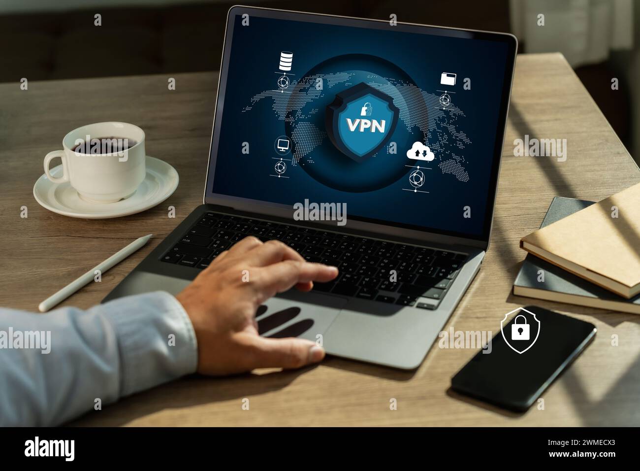 VPN Security Network with man using a laptop protection private network Stock Photo