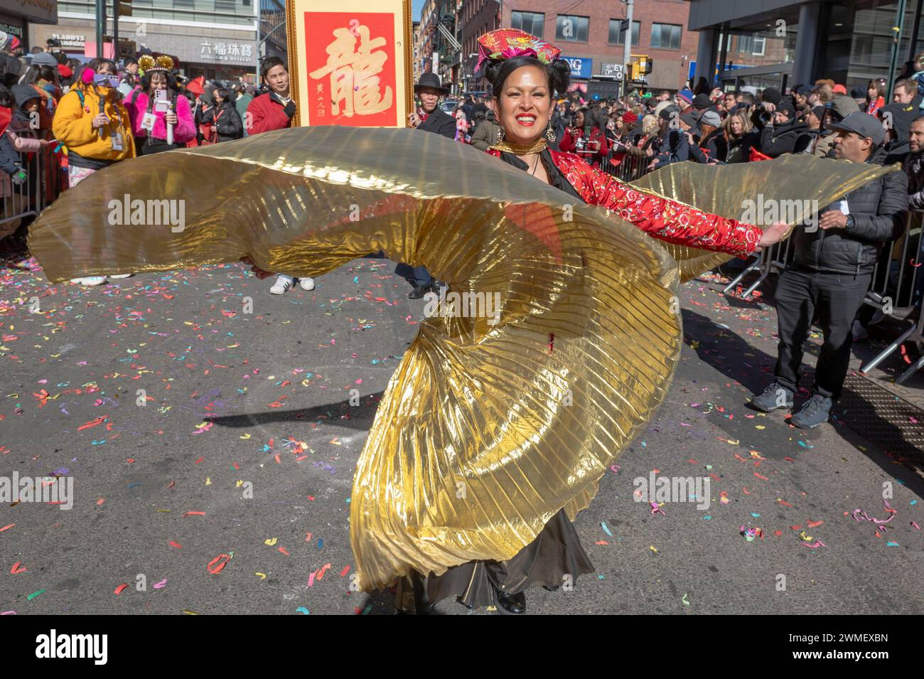 New York, United States. 25th Feb, 2024. NEW YORK, NEW YORK - FEBRUARY 25: A dancer performs at the annual Lunar New Year parade in Chinatown on February 25, 2024 in New York City. People gathered to enjoy and celebrate the 26th annual Lunar New Year parade, commemorating the end of the 15 days honoring the first new moon on the lunar calendar. 2024 is the 'Year of the Dragon.' Credit: Ron Adar/Alamy Live News Stock Photo