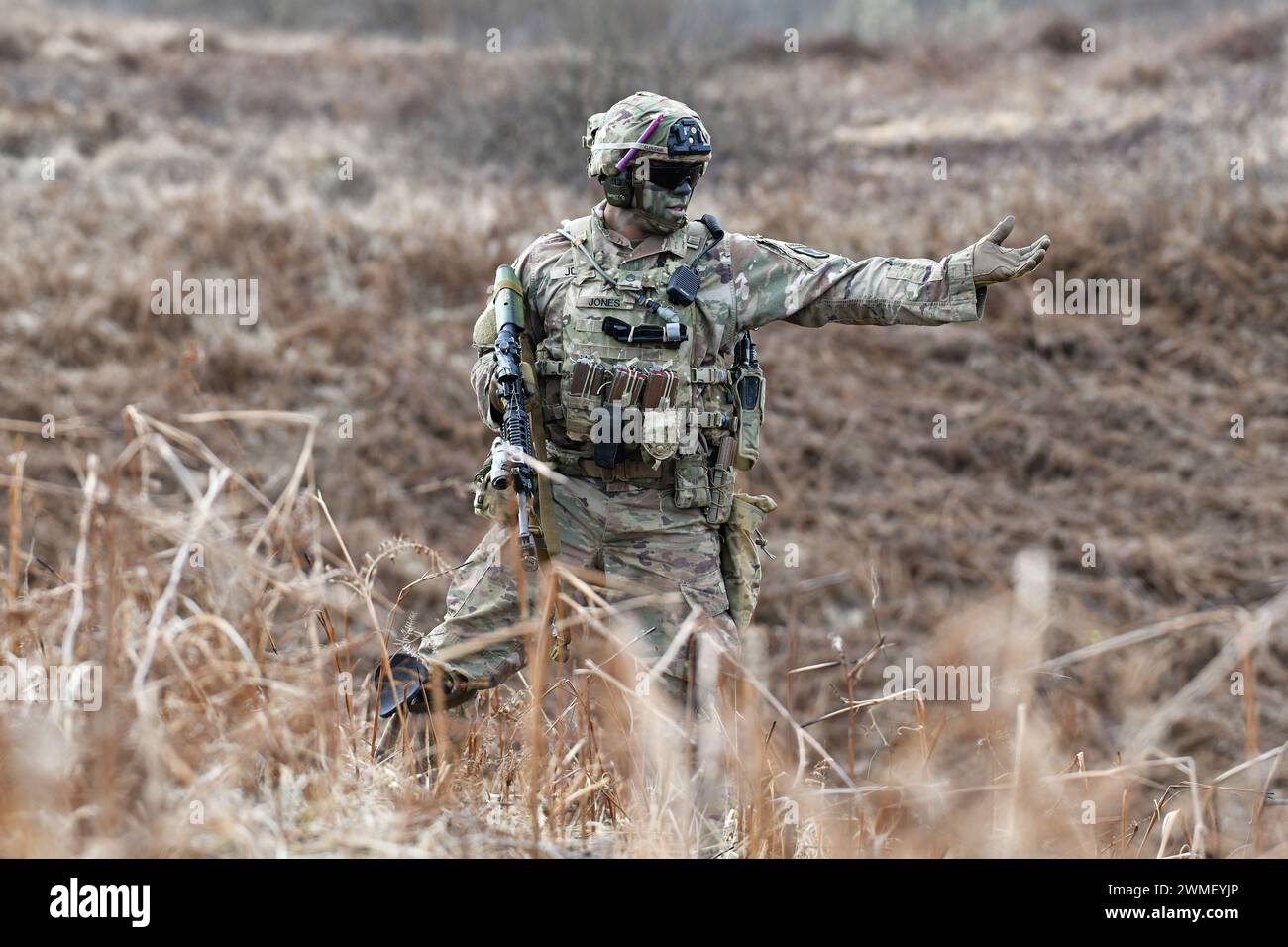 A U.S. Army Paratrooper assigned to the 1st Battalion, 503rd Infantry Regiment, 173rd Airborne Brigade, moves toward an objective during team blank-fire and tactical movement training  as part of Eagle Ursa at the training range in Slunj, Croatia, Feb. 24, 2024. The 173rd Airborne Brigade is the U.S. Army's Contingency Response Force in Europe, providing rapidly deployable forces to the United States European, African, and Central Command areas of responsibility. Forward deployed across Italy and Germany, the brigade routinely trains alongside NATO allies and partners to build partnerships and Stock Photo