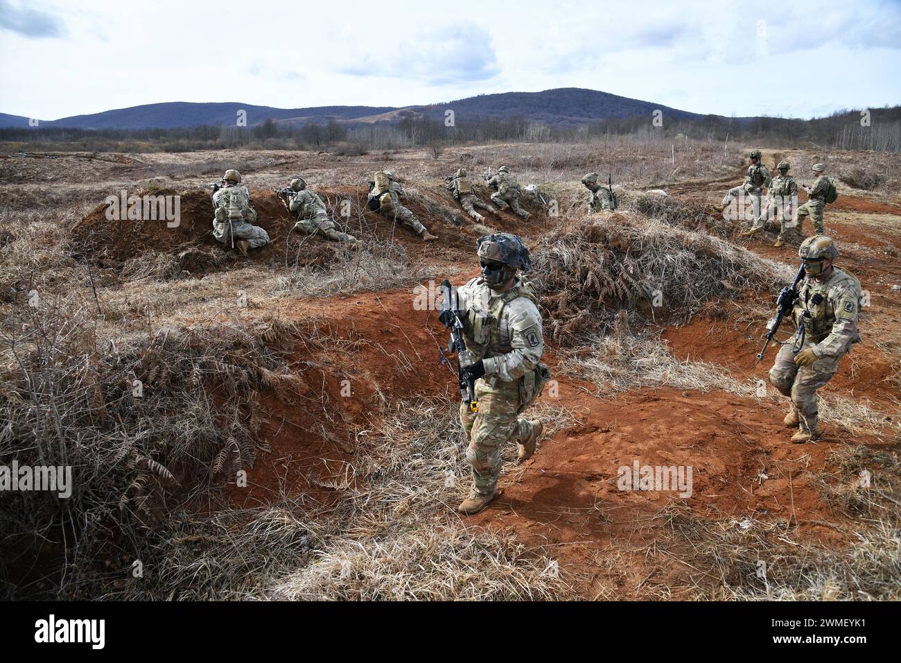 U.S. Army Paratroopers assigned to the 1st Battalion, 503rd Infantry Regiment, 173rd Airborne Brigade, engage a target during team blank-fire and tactical movement training  as part of Eagle Ursa at the training range in Slunj, Croatia, Feb. 24, 2024. The 173rd Airborne Brigade is the U.S. Army's Contingency Response Force in Europe, providing rapidly deployable forces to the United States European, African, and Central Command areas of responsibility. Forward deployed across Italy and Germany, the brigade routinely trains alongside NATO allies and partners to build partnerships and strengthen Stock Photo