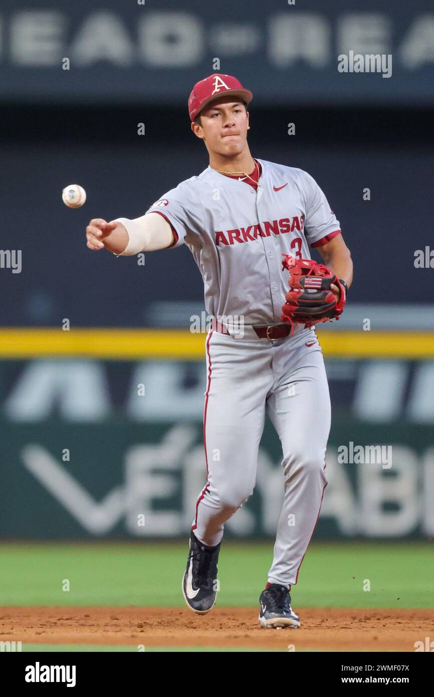 February 25, 2024: Razorback infielder Nolan Souza #3 releases the ball towards first base. Arkansas defeated Michigan 4-3 in Arlington, TX. Richey Miller/CSM Stock Photo