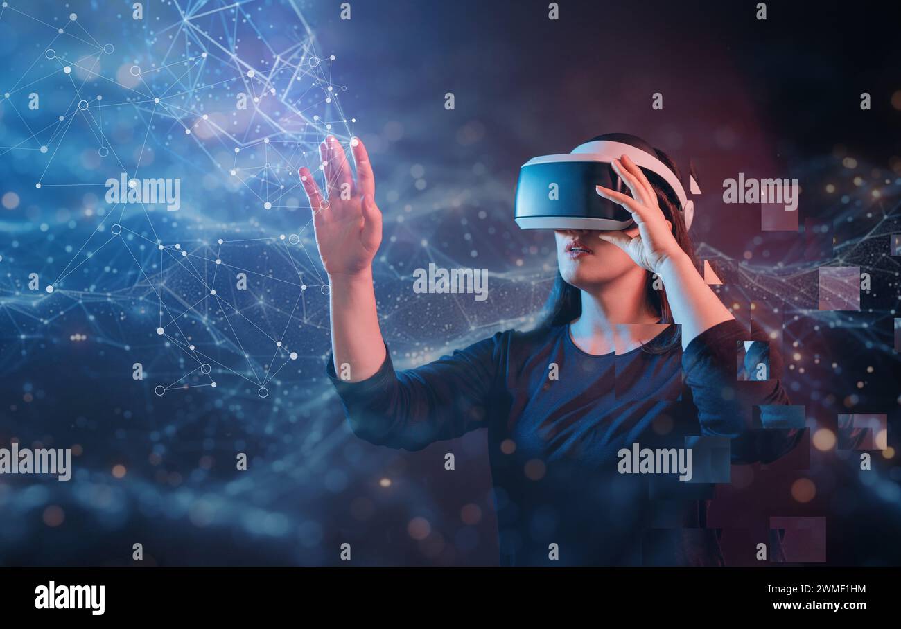Metaverse technology concept. Woman with VR virtual reality goggles. Futuristic lifestyle. Stock Photo