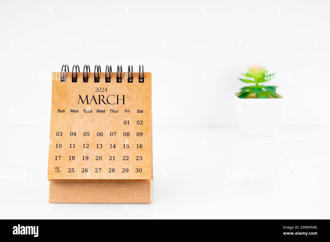 March 2024 Monthly desk calendar for 2024 year with plant pot on white ...