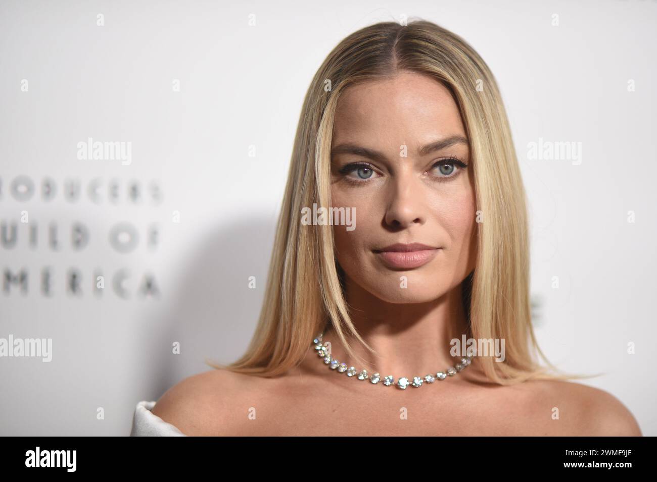 Margot Robbie arrives at the 35th Annual Producers Guild Awards on ...