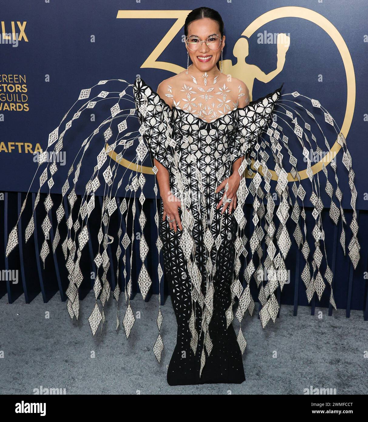 LOS ANGELES, CALIFORNIA, USA - FEBRUARY 24: Ali Wong wearing an Iris Van Herpen Couture dress and Brandon Blackwood shoes arrives at the 30th Annual Screen Actors Guild Awards held at the Shrine Auditorium and Expo Hall on February 24, 2024 in Los Angeles, California, United States. (Photo by Xavier Collin/Image Press Agency) Stock Photo