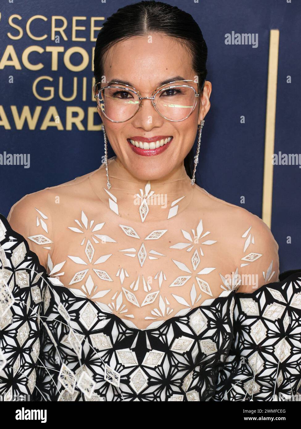 LOS ANGELES, CALIFORNIA, USA - FEBRUARY 24: Ali Wong wearing an Iris Van Herpen Couture dress and Brandon Blackwood shoes arrives at the 30th Annual Screen Actors Guild Awards held at the Shrine Auditorium and Expo Hall on February 24, 2024 in Los Angeles, California, United States. (Photo by Xavier Collin/Image Press Agency) Stock Photo