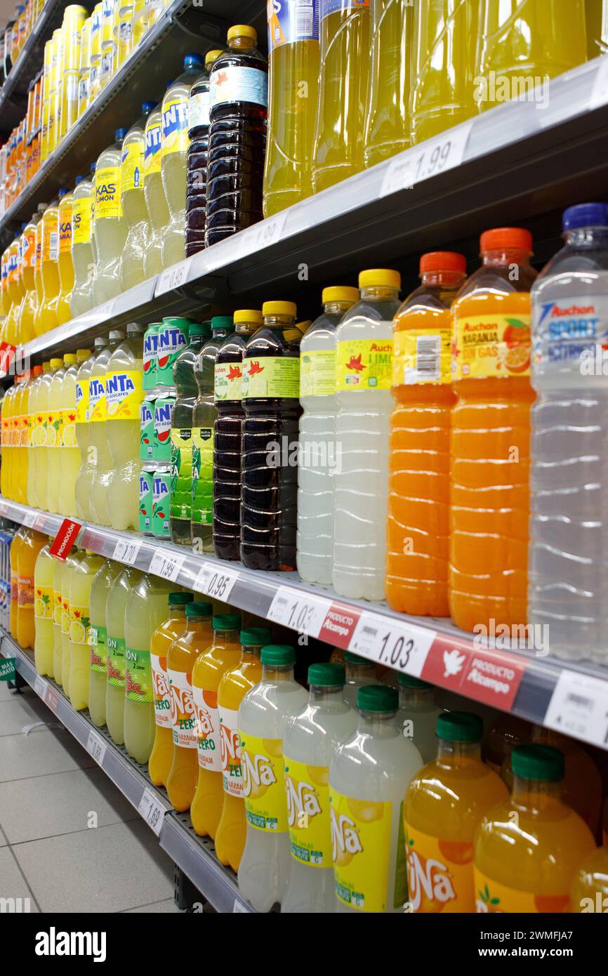 Valladolid, Spain - February 18, 2024: Interior of Mercado del Val, shelf with sugary drinks of different brands Stock Photo