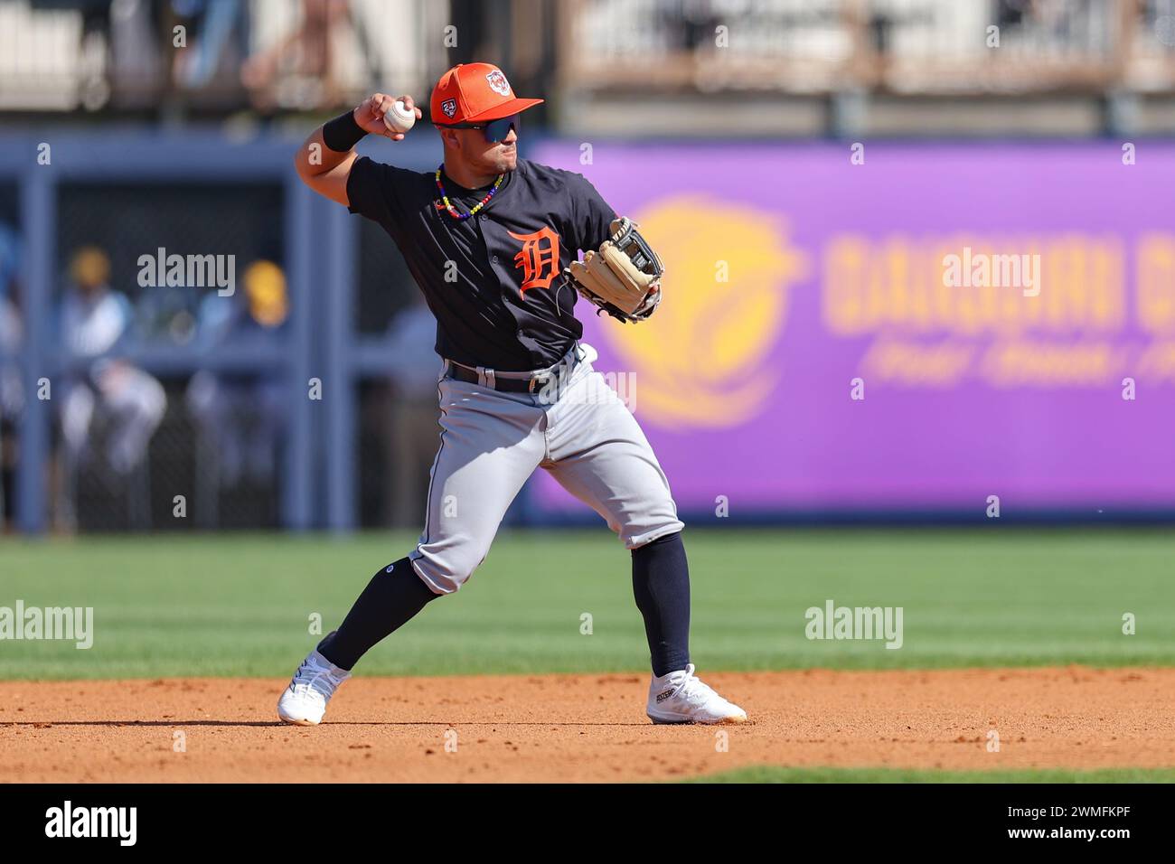 Port Charlotte, FL: Detroit Tigers second baseman Carlos Mendoza (89) fields and throws to first during an MLB spring training game against the Tampa Stock Photo