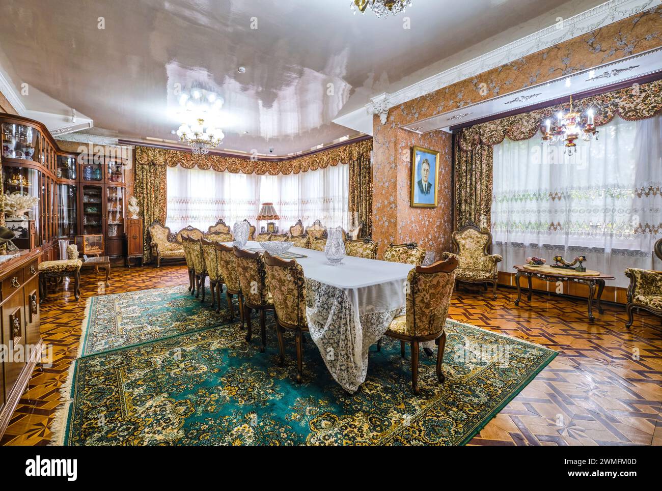 Interior view of the large dining room with walls of china cabinets. At ...