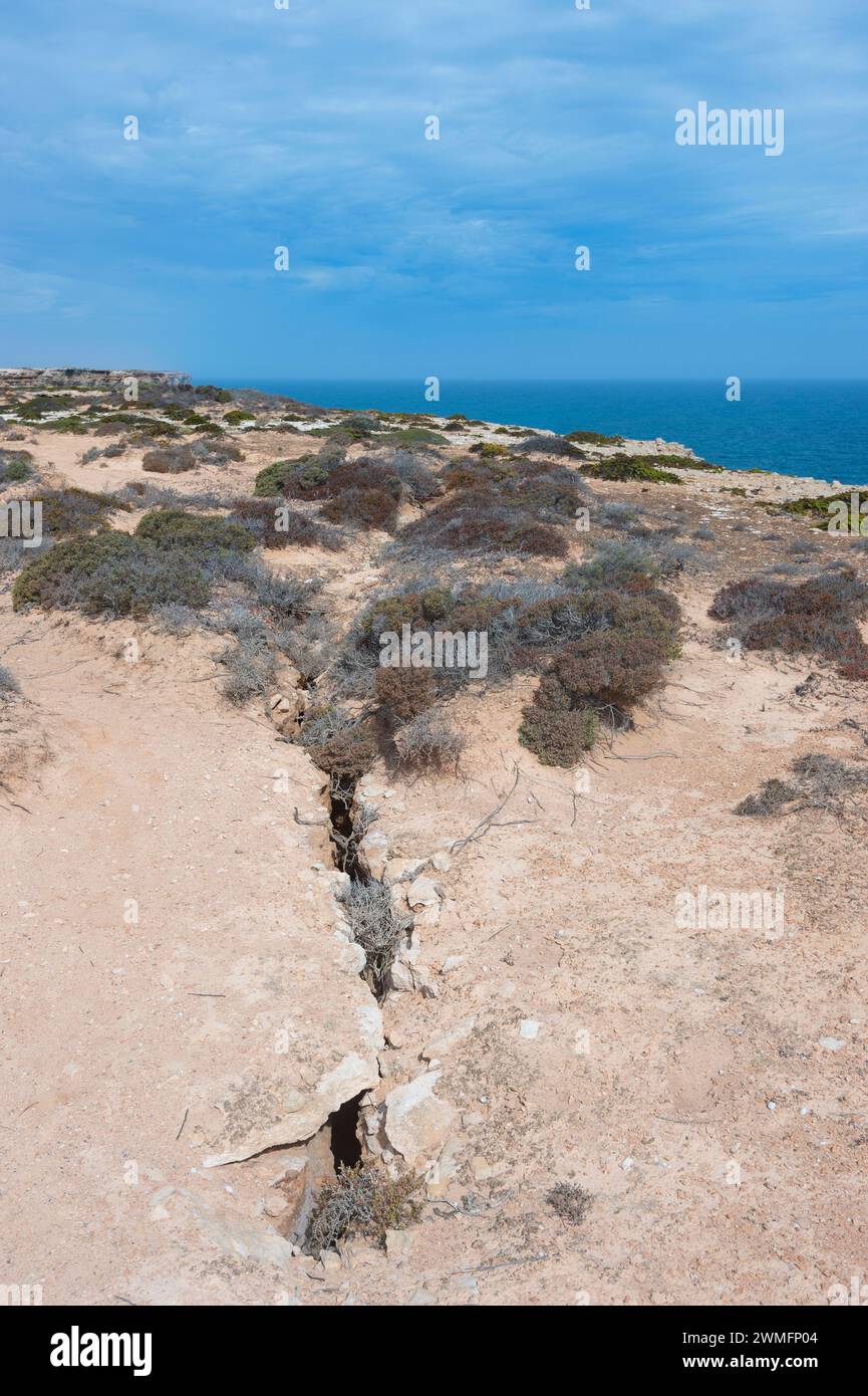 Dangerous crack in the Nullarbor cliffs due to coastal erosion, South Australia, SA, Australia Stock Photo