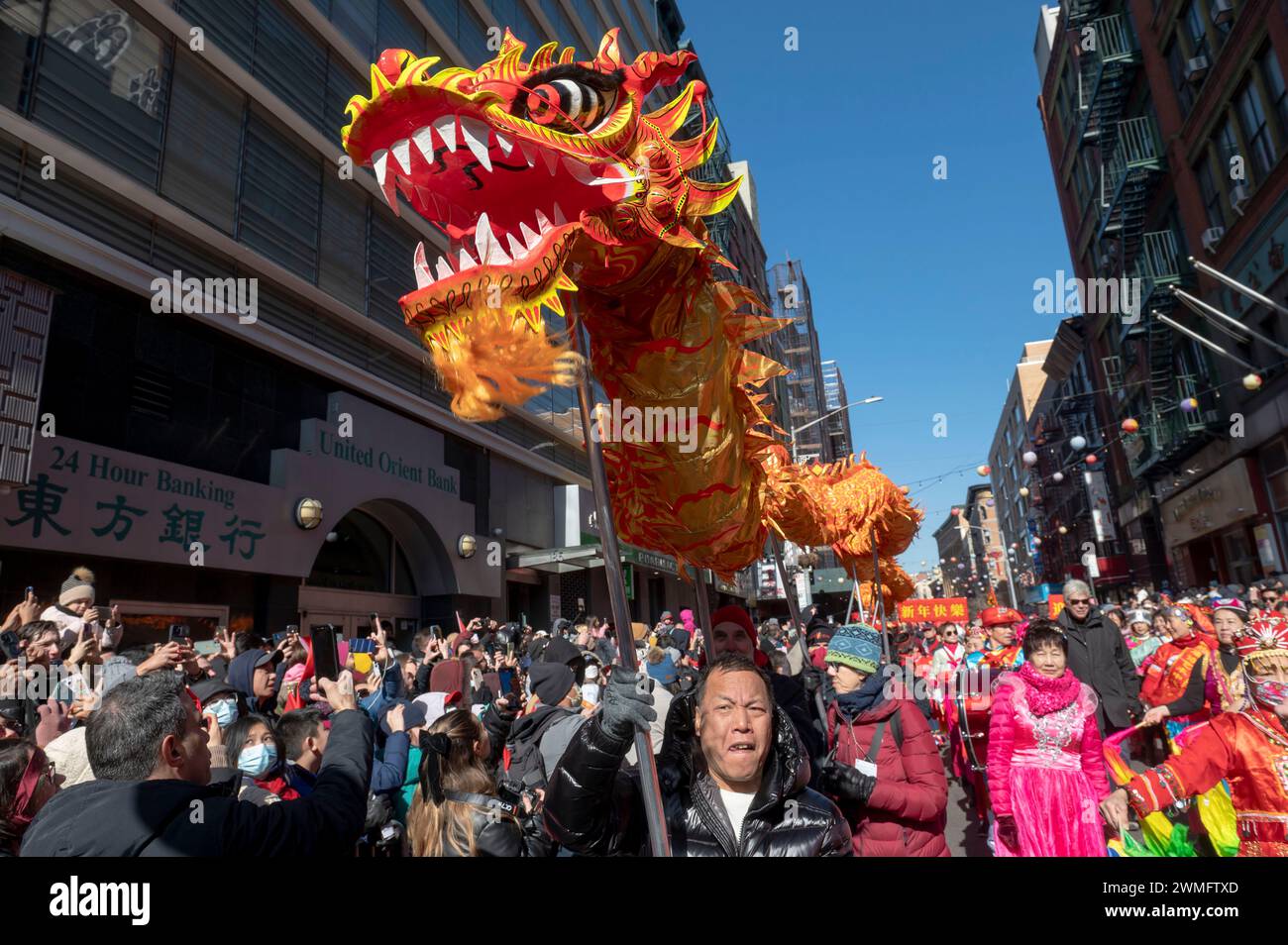 New York, United States. 25th Feb, 2024. Dragon dancers participate in the annual Lunar New Year parade in Chinatown on February 25, 2024 in New York City. People gathered to enjoy and celebrate the 26th annual Lunar New Year parade, commemorating the end of the 15 days honoring the first new moon on the lunar calendar. 2024 is the 'Year of the Dragon.' (Photo by Ron Adar/SOPA Images/Sipa USA) Credit: Sipa USA/Alamy Live News Stock Photo